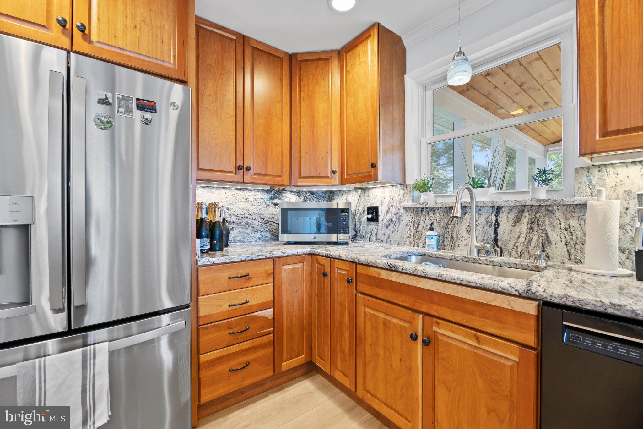 6705 New Hope Drive Springfield, VA 22151 - Photo 29 of 67 Charming kitchen with modern finishes.