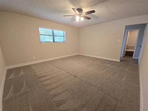 19103 Whitewood Drive Spring, TX 77373 - Photo 14 of 30 an empty room with windows and entrance