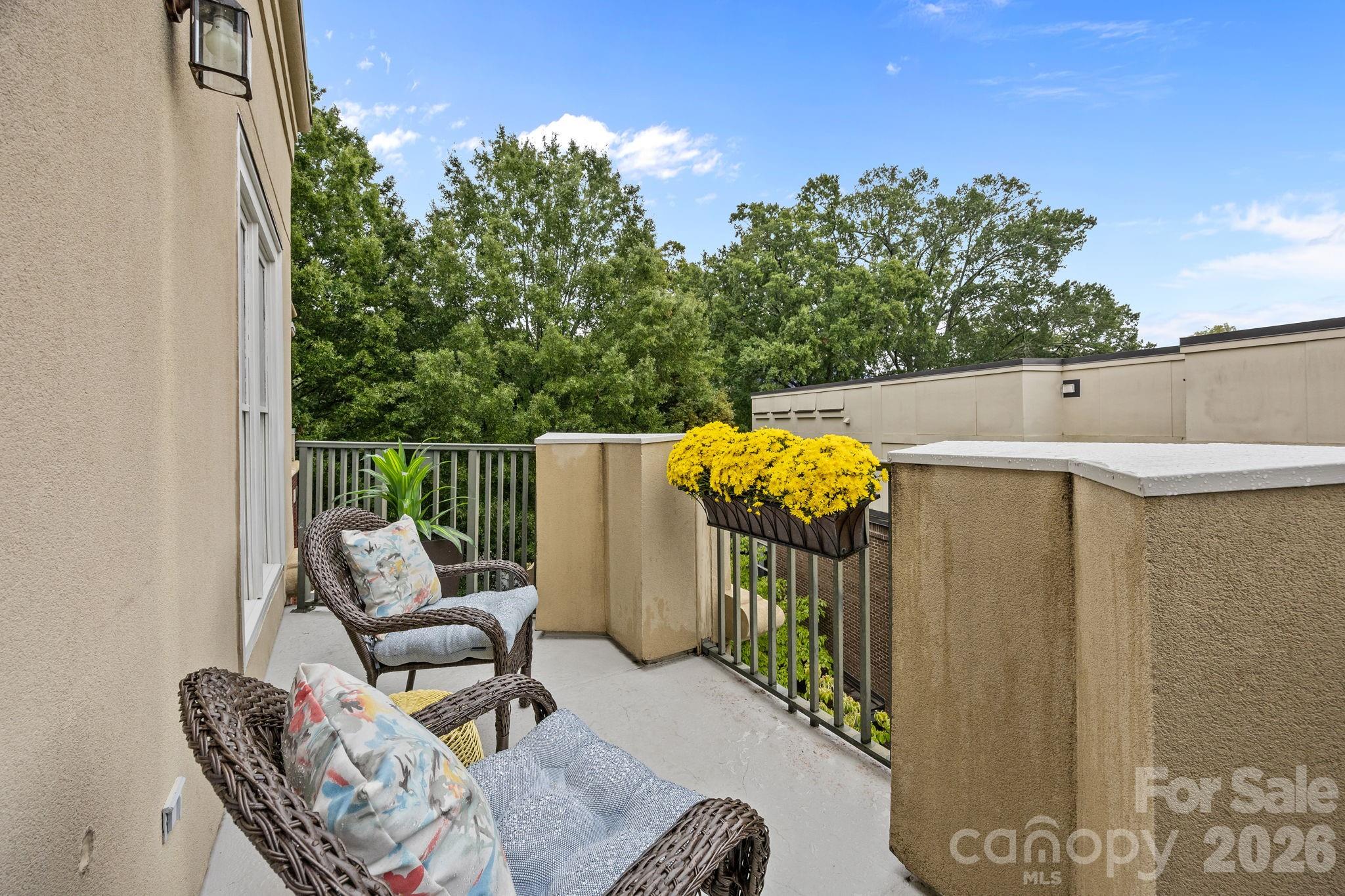 416 Queens Road, Unit 19 Charlotte, NC 28207 - Photo 14 of 24 a view of balcony with furniture