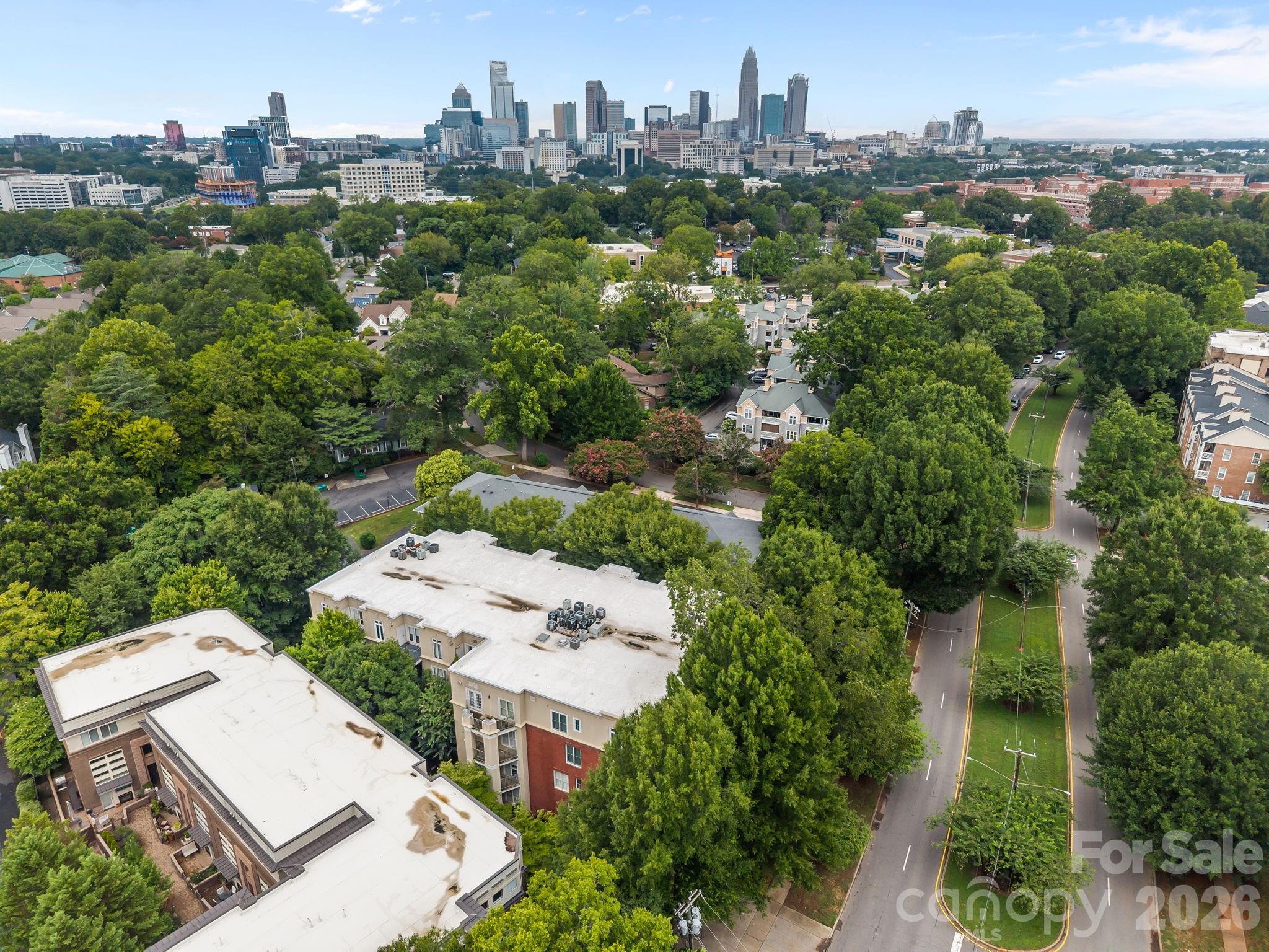 416 Queens Road, Unit 19 Charlotte, NC 28207 - Photo 17 of 23 an aerial view of a house with outdoor space
