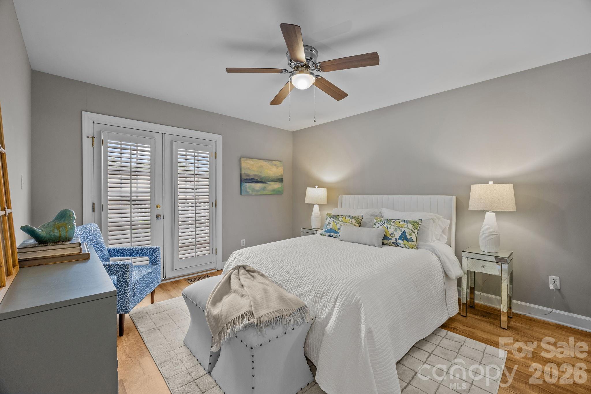 416 Queens Road, Unit 19 Charlotte, NC 28207 - Photo 10 of 23 a bedroom with a bed and window