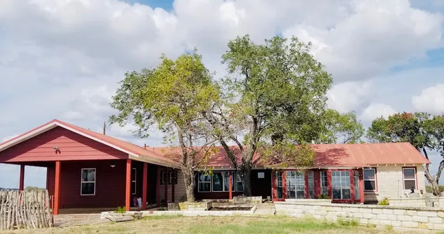 a front view of a building with street view