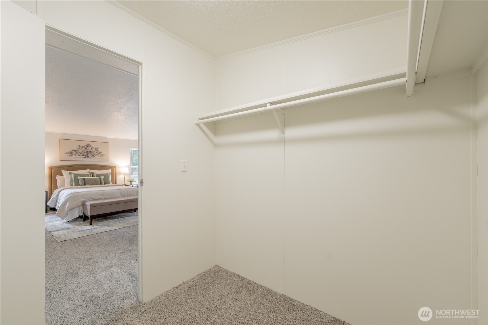 10794 Halloran Road Bow, WA 98232 - Photo 24 of 39 a view of bedroom and a car parked in a room
