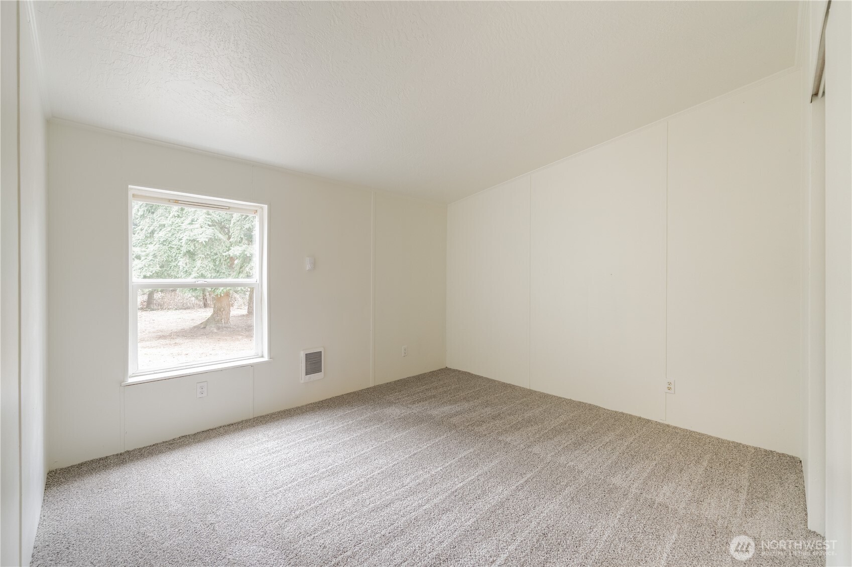 10794 Halloran Road Bow, WA 98232 - Photo 27 of 39 an empty room with a window