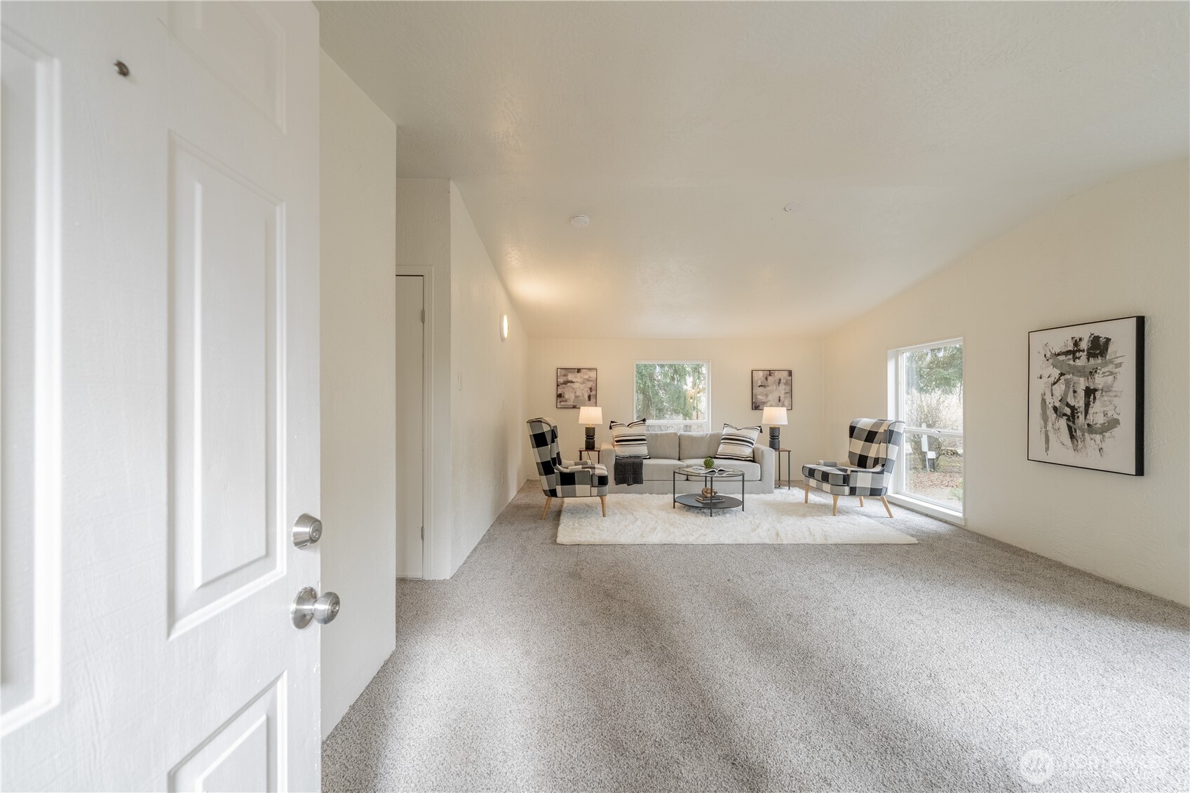 10794 Halloran Road Bow, WA 98232 - Photo 6 of 39 a view of a dining room with furniture and a chandelier