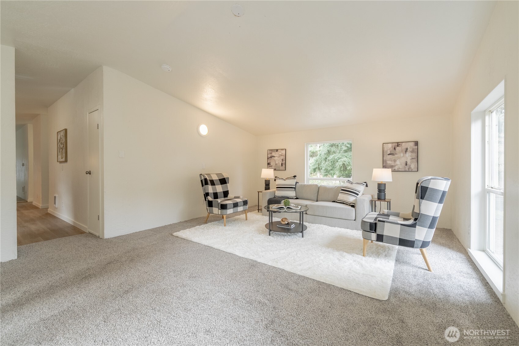 10794 Halloran Road Bow, WA 98232 - Photo 7 of 39 a living room with furniture and a large window