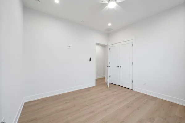 a bathroom with a toilet and shower