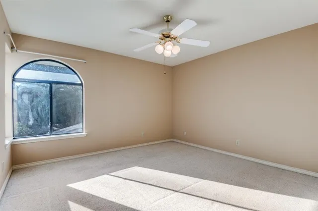 wooden floor in a room with a window