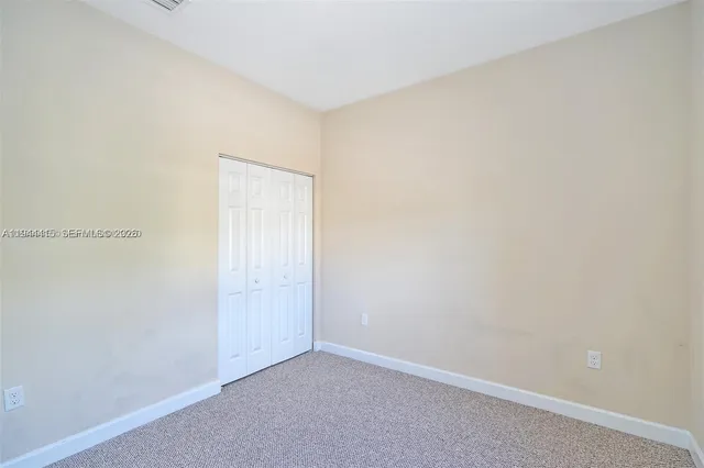 a view of a livingroom with wooden floor