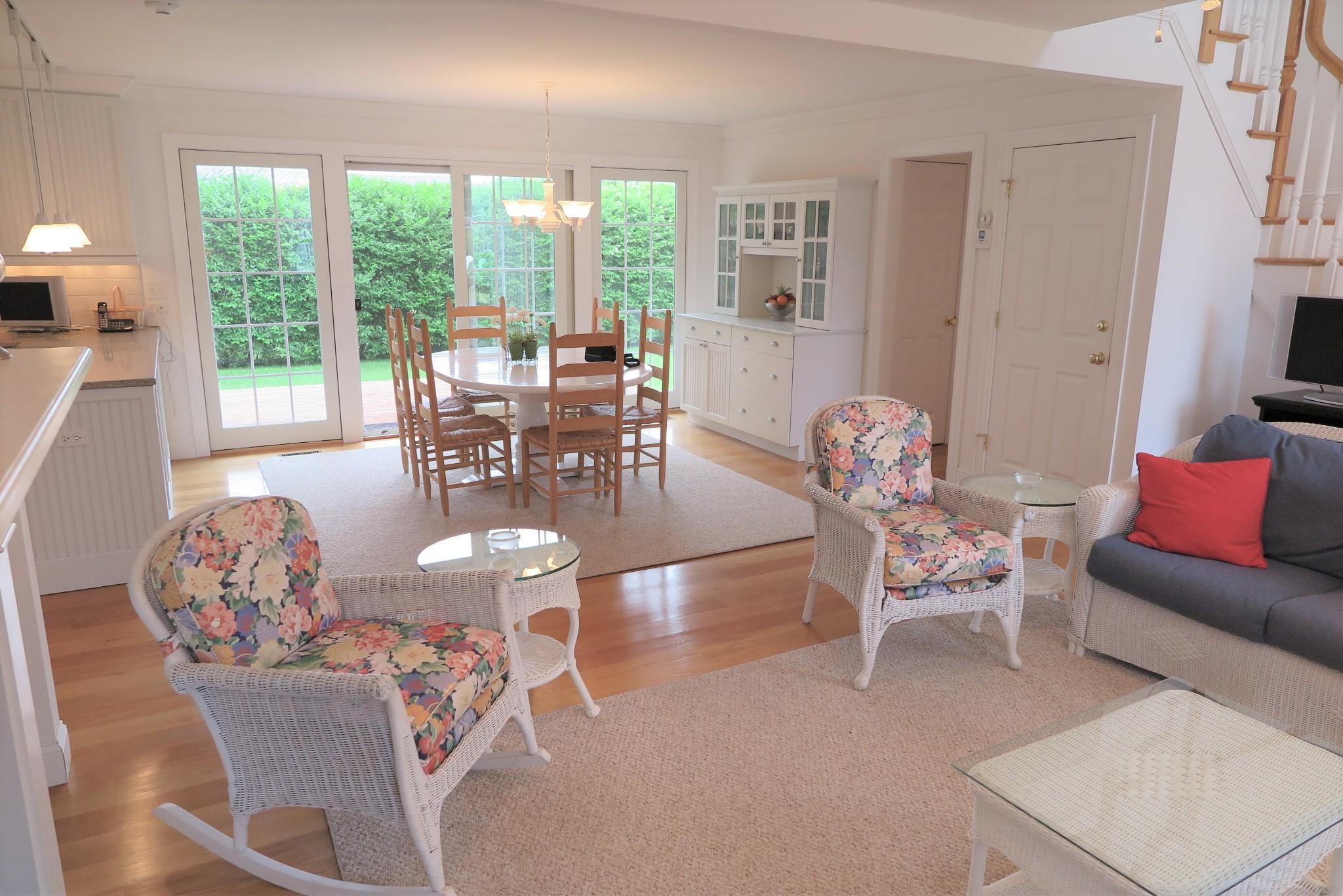 79 Shore Road West Dennis, MA 02670 - Photo 11 of 42 a dining room with furniture mountain view and a large window