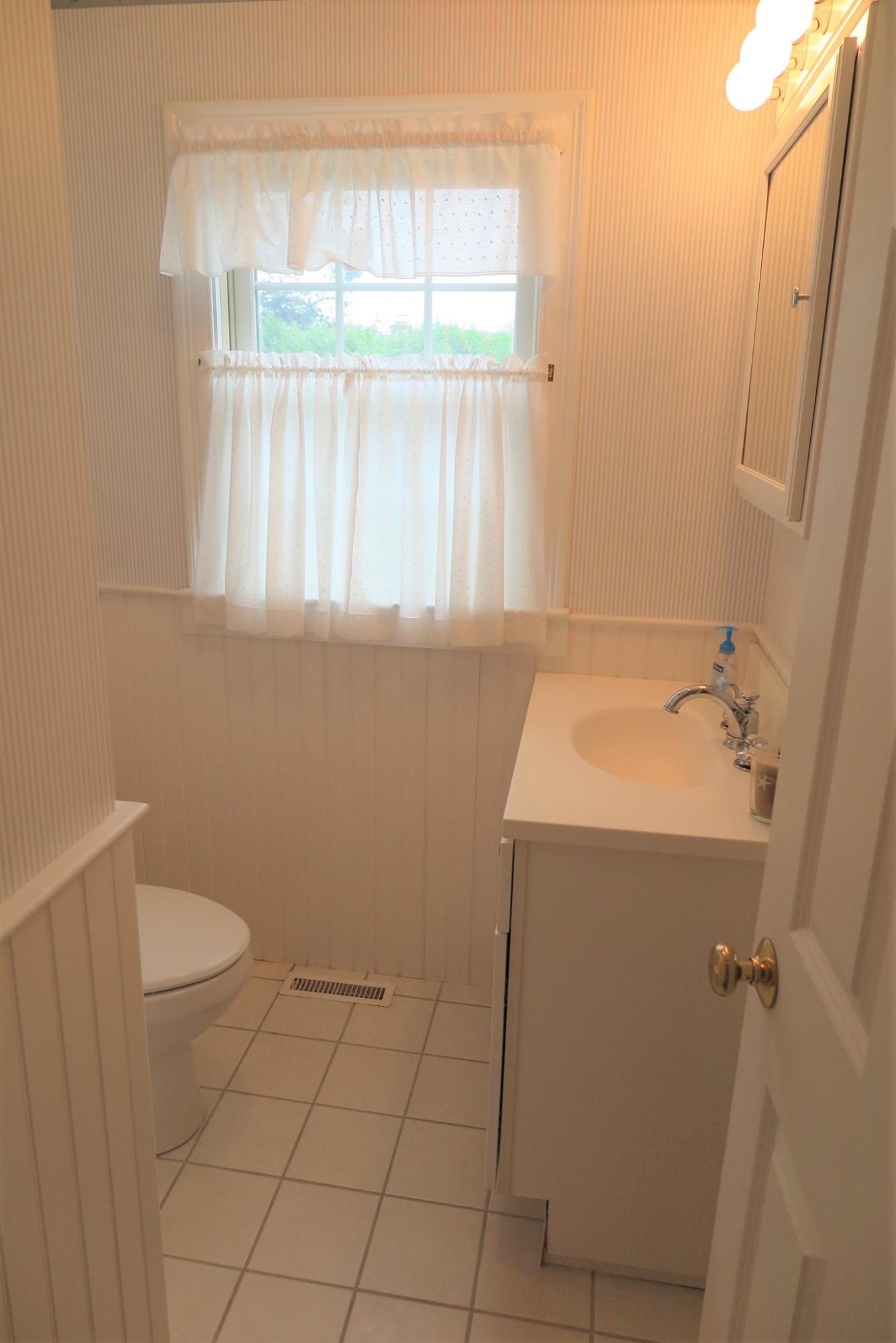 79 Shore Road West Dennis, MA 02670 - Photo 26 of 42 a bathroom with a sink and a vanity
