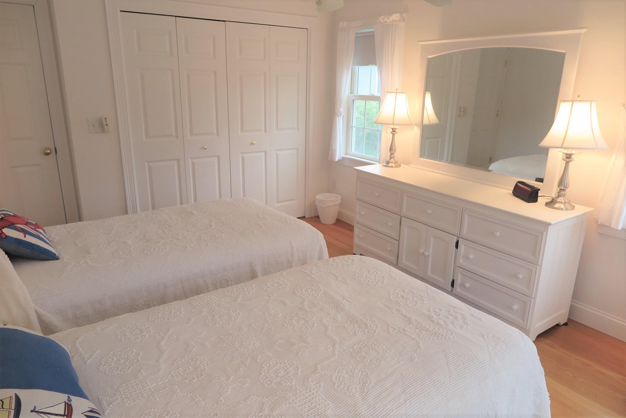 79 Shore Road West Dennis, MA 02670 - Photo 31 of 42 a bedroom with a bed and a sink