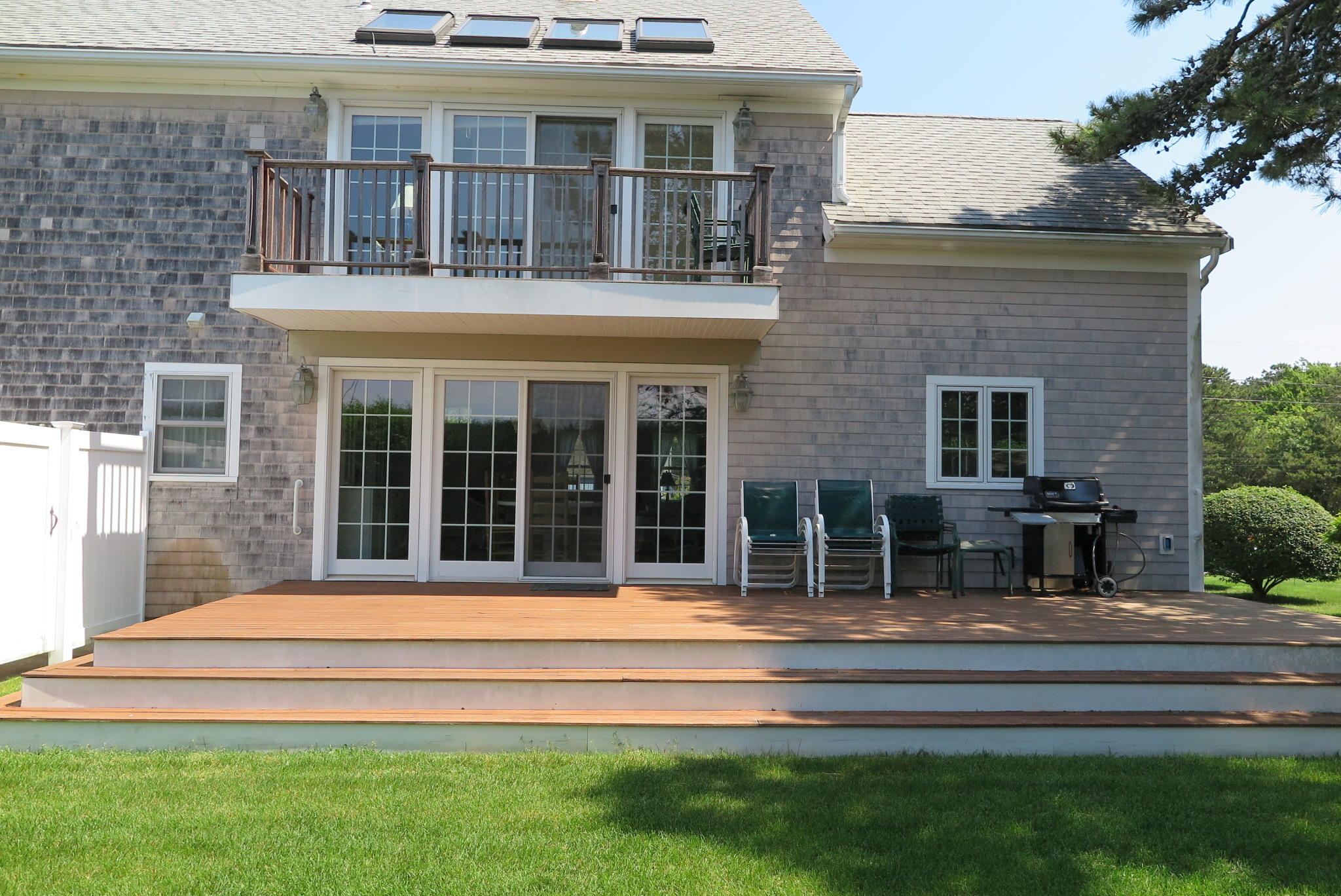 79 Shore Road West Dennis, MA 02670 - Photo 41 of 42 a house view with a garden space