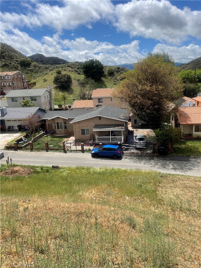 15 Driver Avenue Val Verde, CA 91384 - Photo 12 of 16 a view of a lake with houses