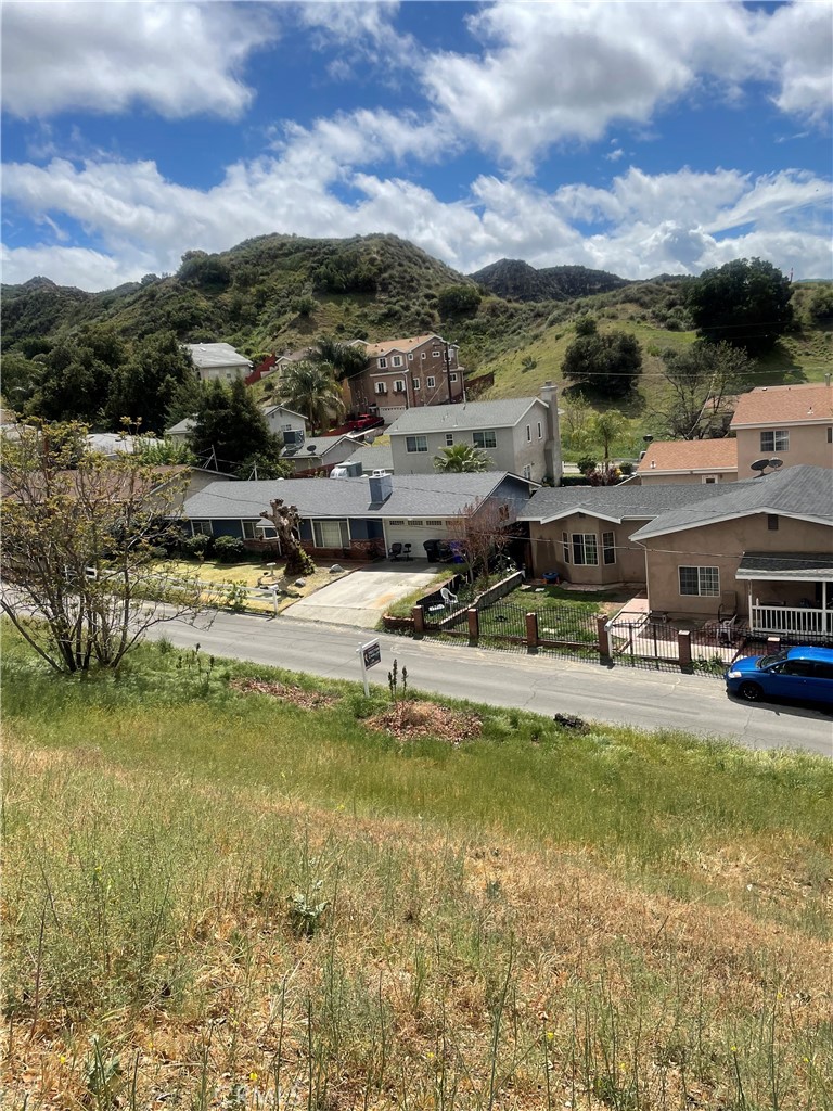 15 Driver Avenue Val Verde, CA 91384 - Photo 14 of 16 a view of a lake with houses