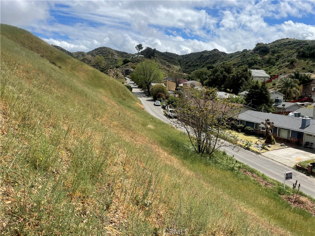 15 Driver Avenue Val Verde, CA 91384 - Photo 8 of 16 a view of residential houses with outdoor space
