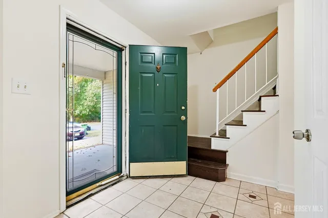 a view of entryway with stairs