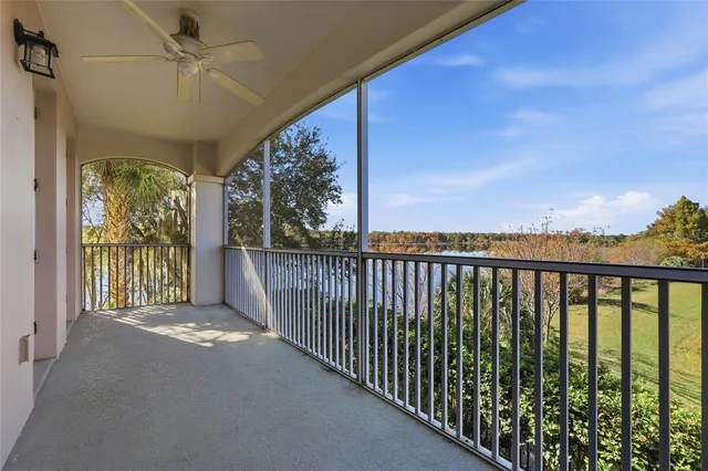 a view of a balcony with furniture