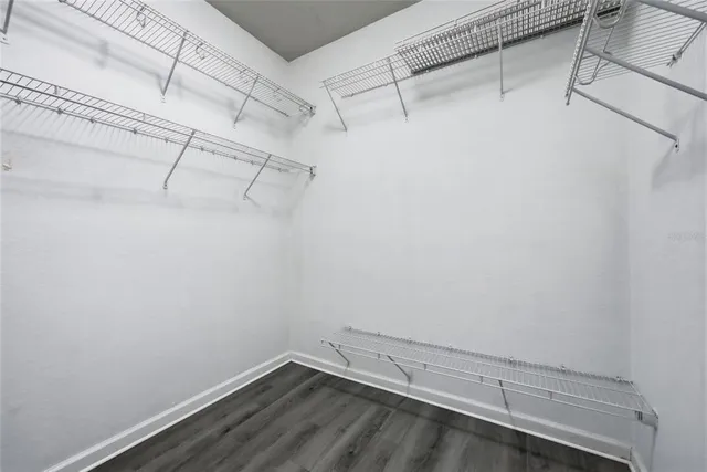 a view of a room with racks on the wall