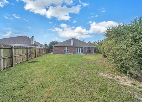 a view of house with outdoor space