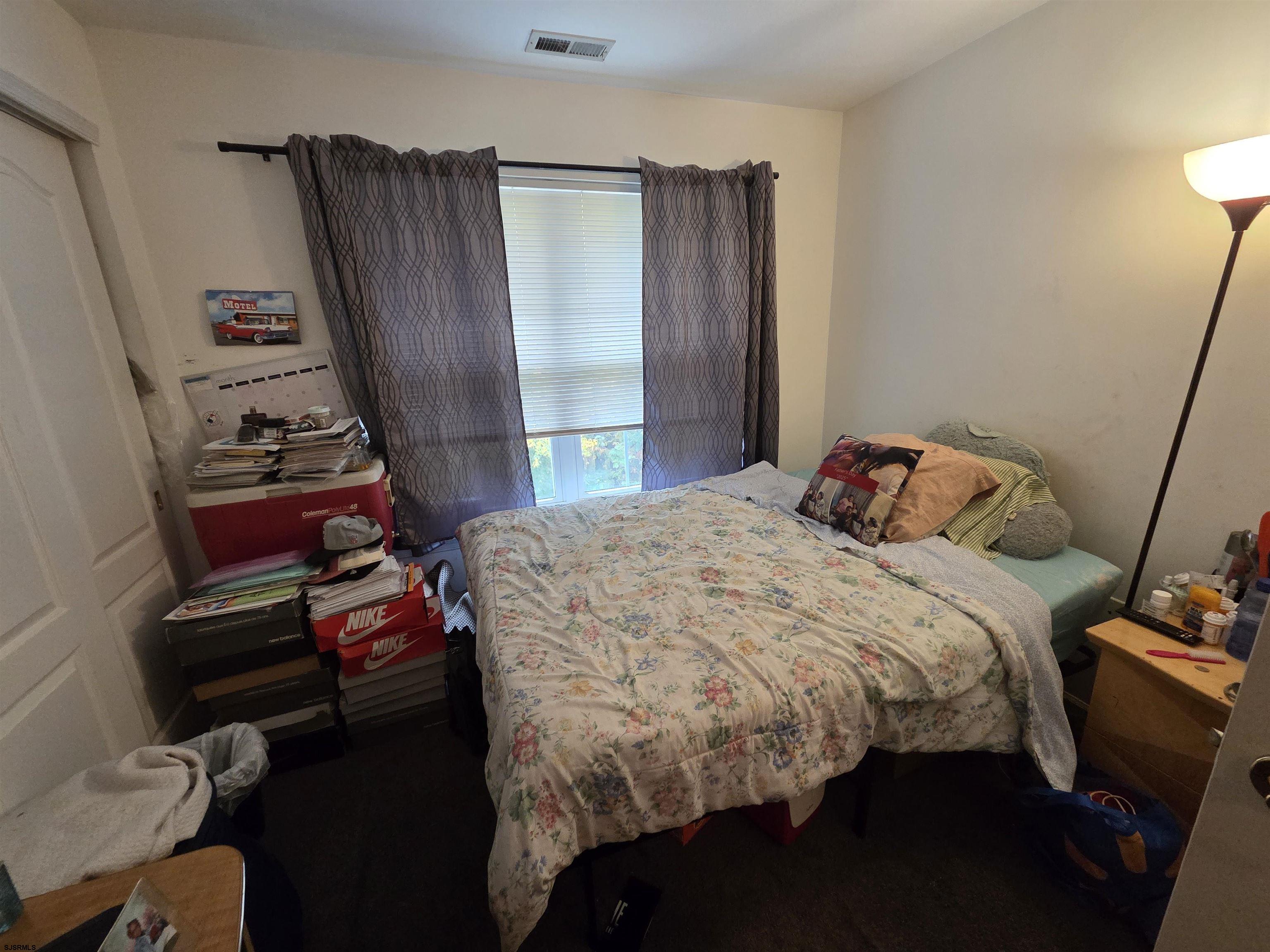 148 Natalie Road, Unit 148 Riverside, NJ 08075 - Photo 13 of 18 a bedroom with a bed and a closet