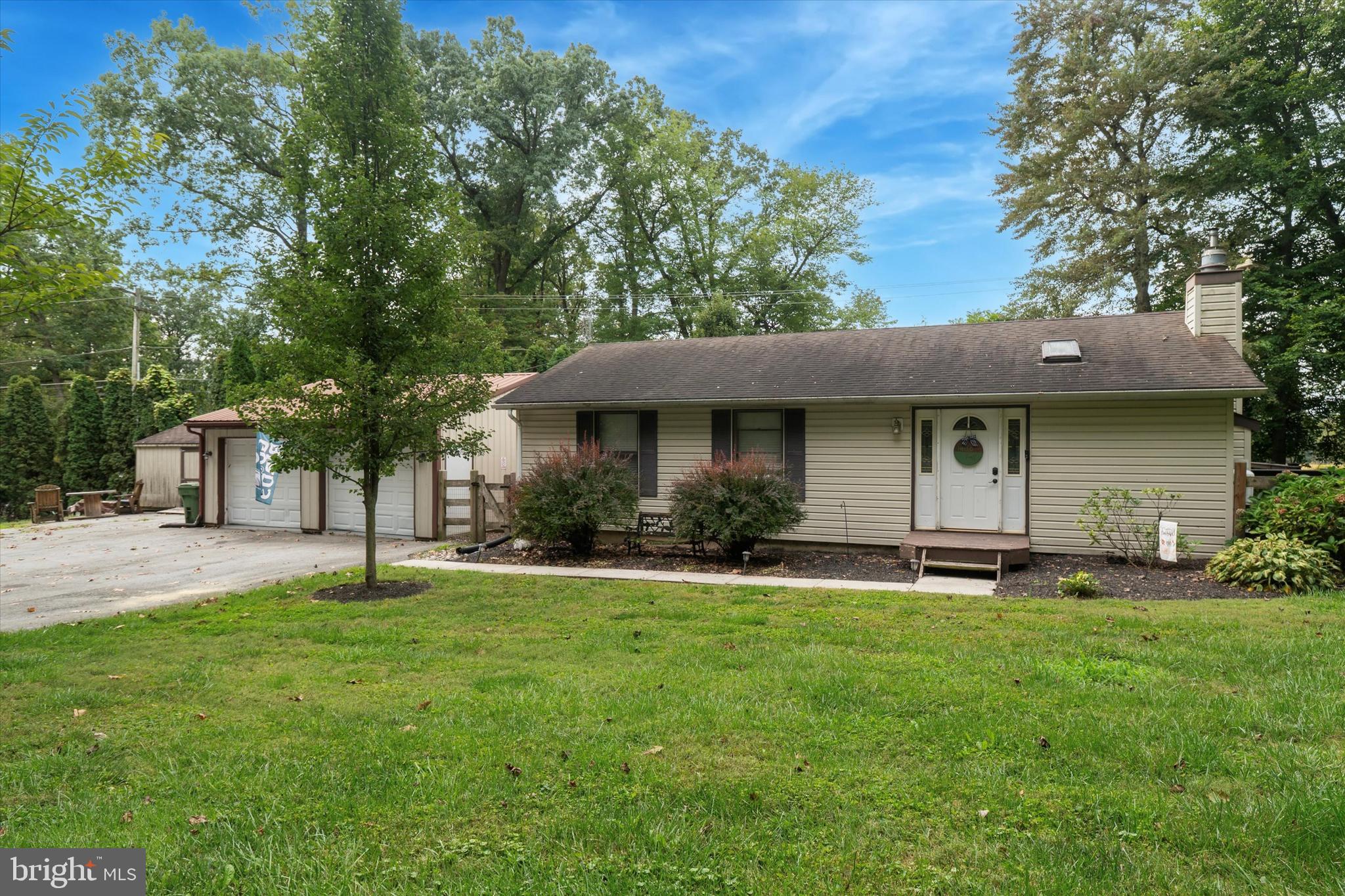 105 Cambridge Road Coatesville, PA 19320 - Photo 2 of 21 a front view of a house with a yard