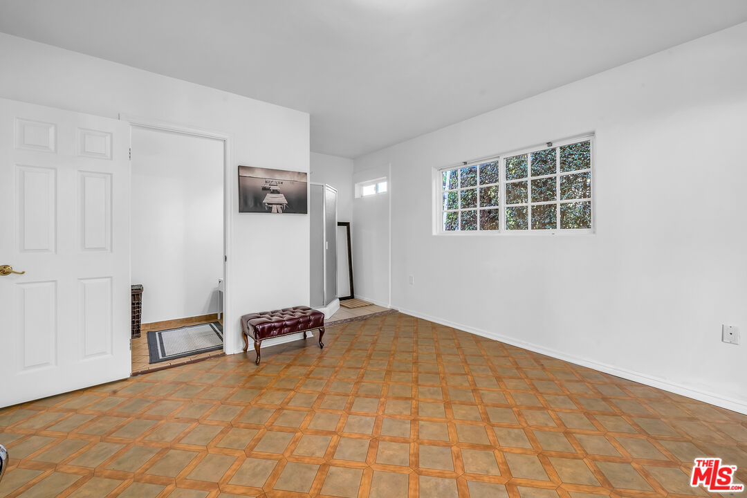 1163 Hi Point Street Los Angeles, CA 90035 - Photo 29 of 29 a view of workspace with windows