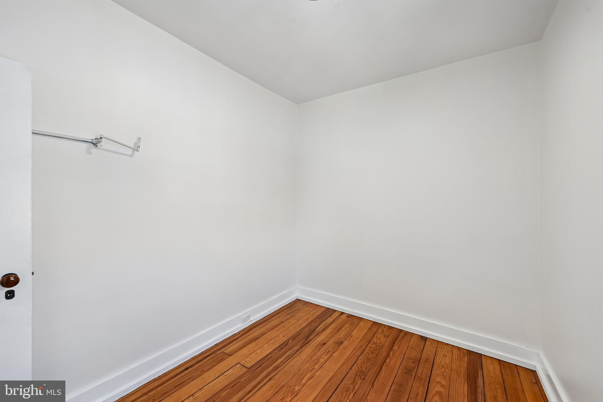 5702 Falls Road Baltimore, MD 21209 - Photo 32 of 49 a view of small space with racks on the wall