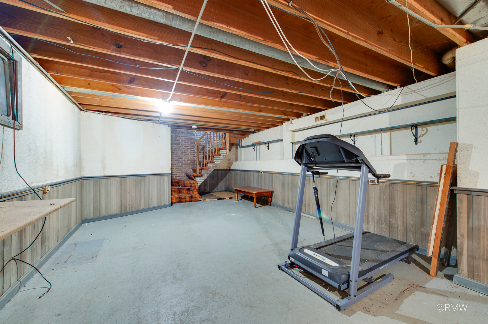 305 East Normandy Drive Addison, IL 60101 - Photo 21 of 24 a view of a room with gym equipment