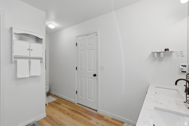 1652 West 800 South Lehi, UT 84043 - Photo 15 of 27 Full bathroom featuring double vanity and light wood-style flooring