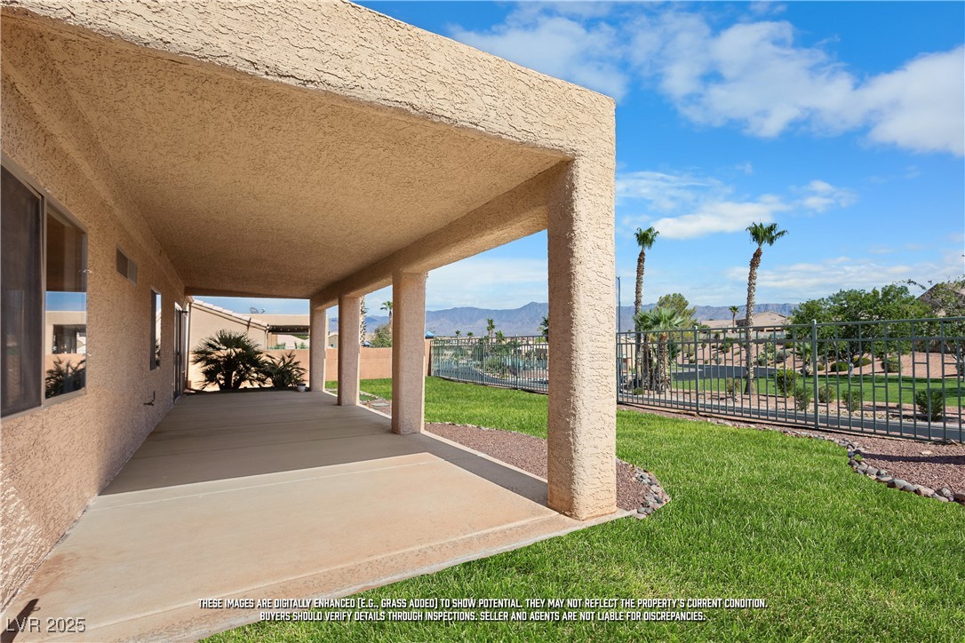 490 Ruby Drive Mesquite, NV 89027 - Photo 1 of 23 View of patio featuring a mountain view