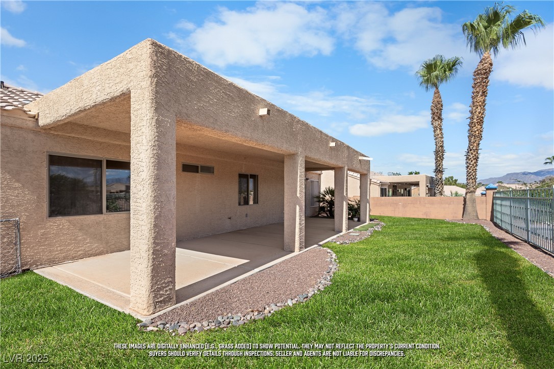 490 Ruby Drive Mesquite, NV 89027 - Photo 18 of 23 Back of property featuring a patio and stucco siding