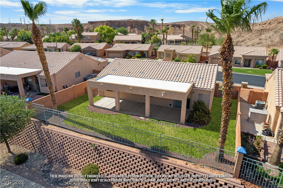 490 Ruby Drive Mesquite, NV 89027 - Photo 20 of 23 Aerial perspective of suburban area with mountains