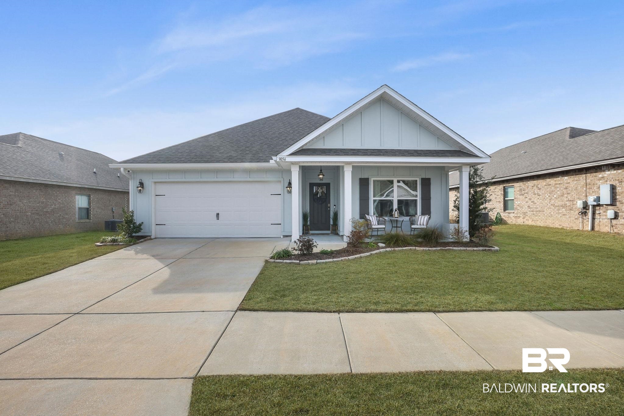 9056 Impala Drive Foley, AL 36535 - Photo 2 of 22 Craftsman-style home featuring a garage, a front yard, and covered porch