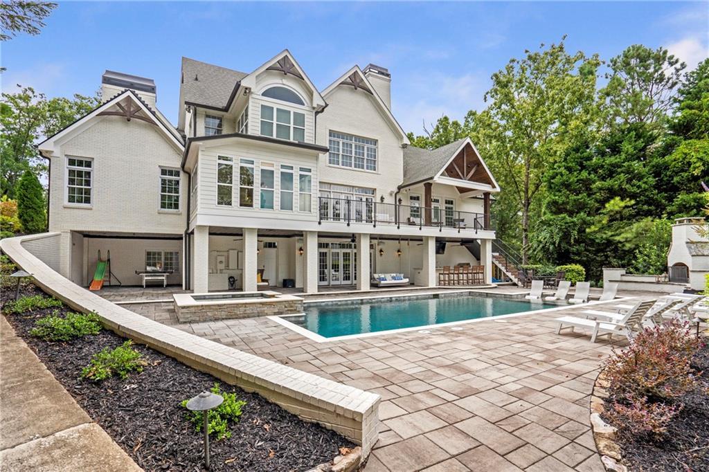 6026 GC Crow Road Flowery Branch, GA 30542 - Photo 51 of 100 a front view of a house with a porch