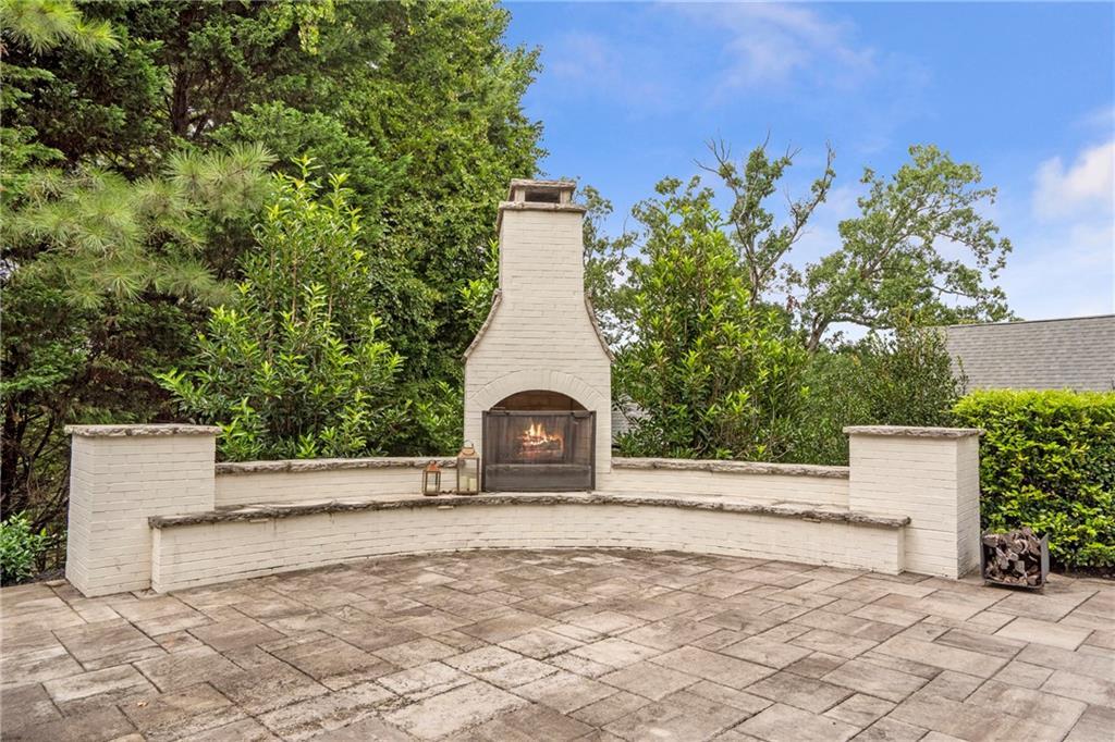 6026 GC Crow Road Flowery Branch, GA 30542 - Photo 54 of 100 a view of a house with a yard and large tree