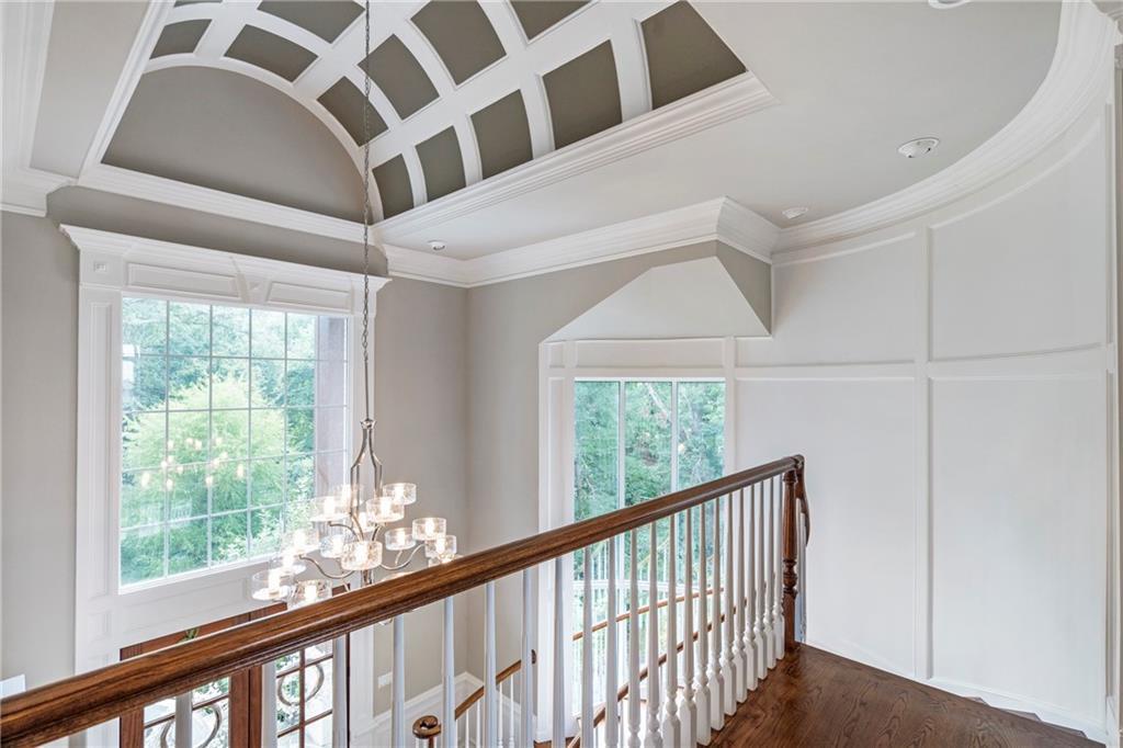 6026 GC Crow Road Flowery Branch, GA 30542 - Photo 63 of 100 a view of staircase with large window