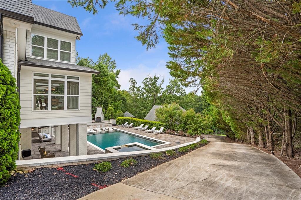 6026 GC Crow Road Flowery Branch, GA 30542 - Photo 71 of 100 a front view of a house with a yard