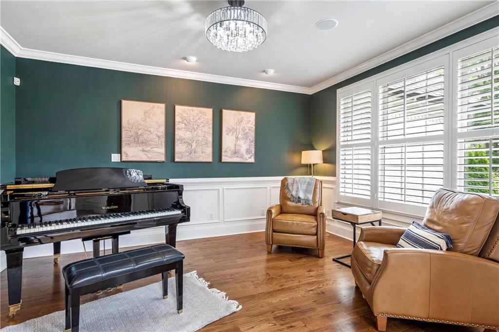 6026 GC Crow Road Flowery Branch, GA 30542 - Photo 10 of 100 a living room with furniture and a large window