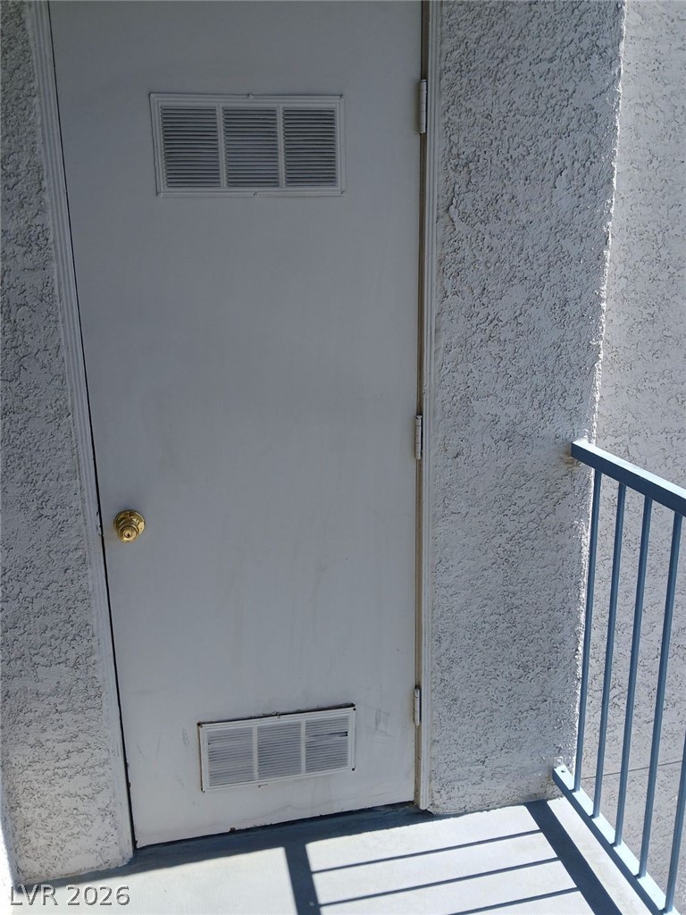 2201 Ramsgate Drive, Unit 426 Henderson, NV 89074 - Photo 21 of 22 Secure access point leading to comfortable living spaces, offering peace of mind and convenience.