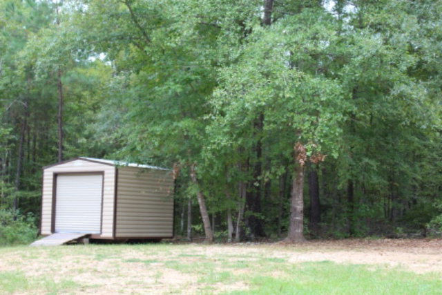 2965 Rumble Road Juliette, GA 31046 - Photo 8 of 8 a view of a house with a backyard