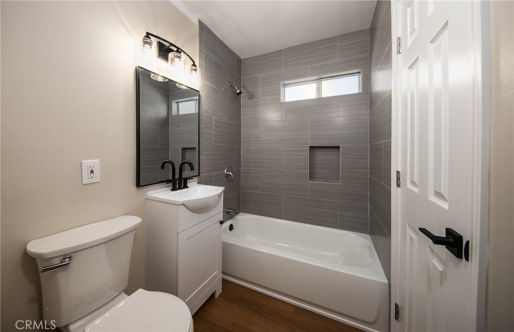 16924 Millstone Drive La Puente, CA 91744 - Photo 14 of 19 a bathroom with a sink a toilet and shower