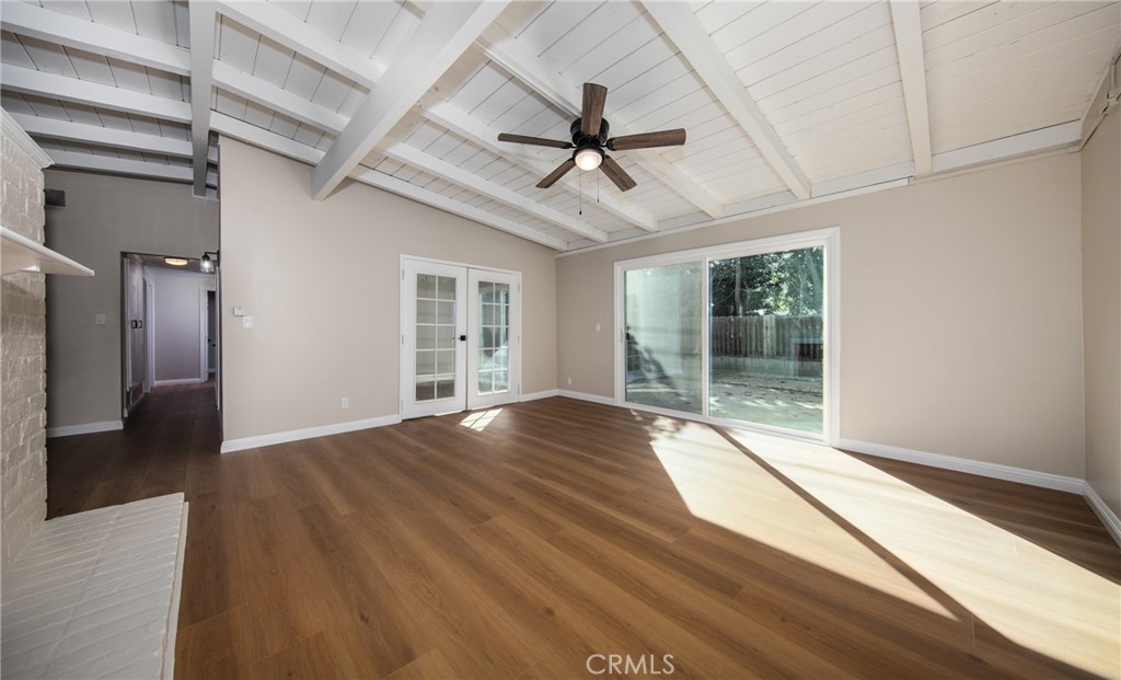16924 Millstone Drive La Puente, CA 91744 - Photo 4 of 19 a view of empty room with wooden floor and fan