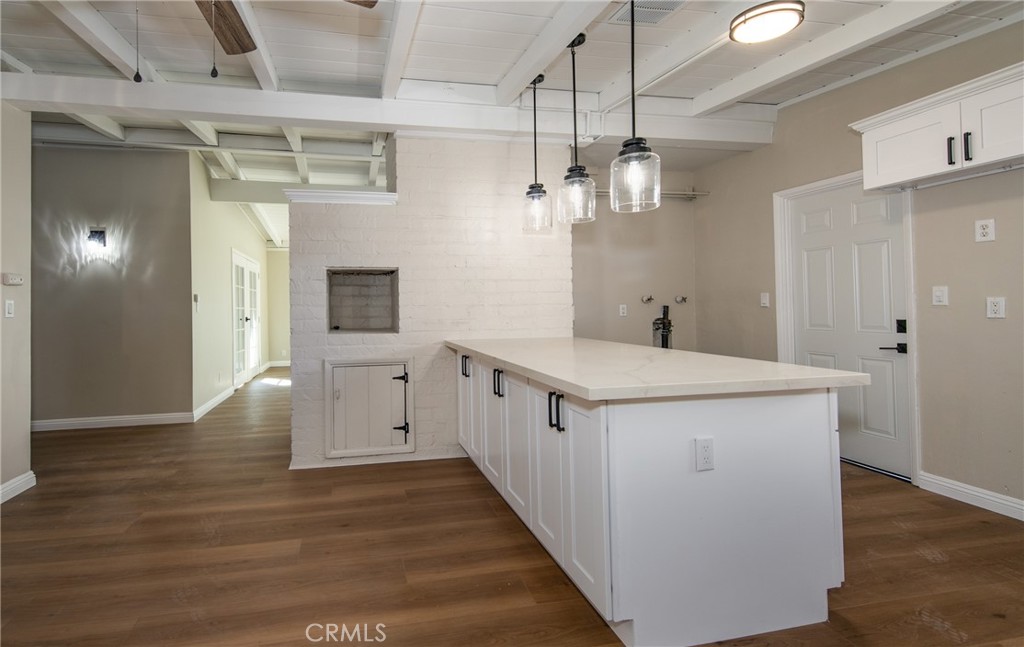 16924 Millstone Drive La Puente, CA 91744 - Photo 9 of 19 a kitchen with a sink and chandelier