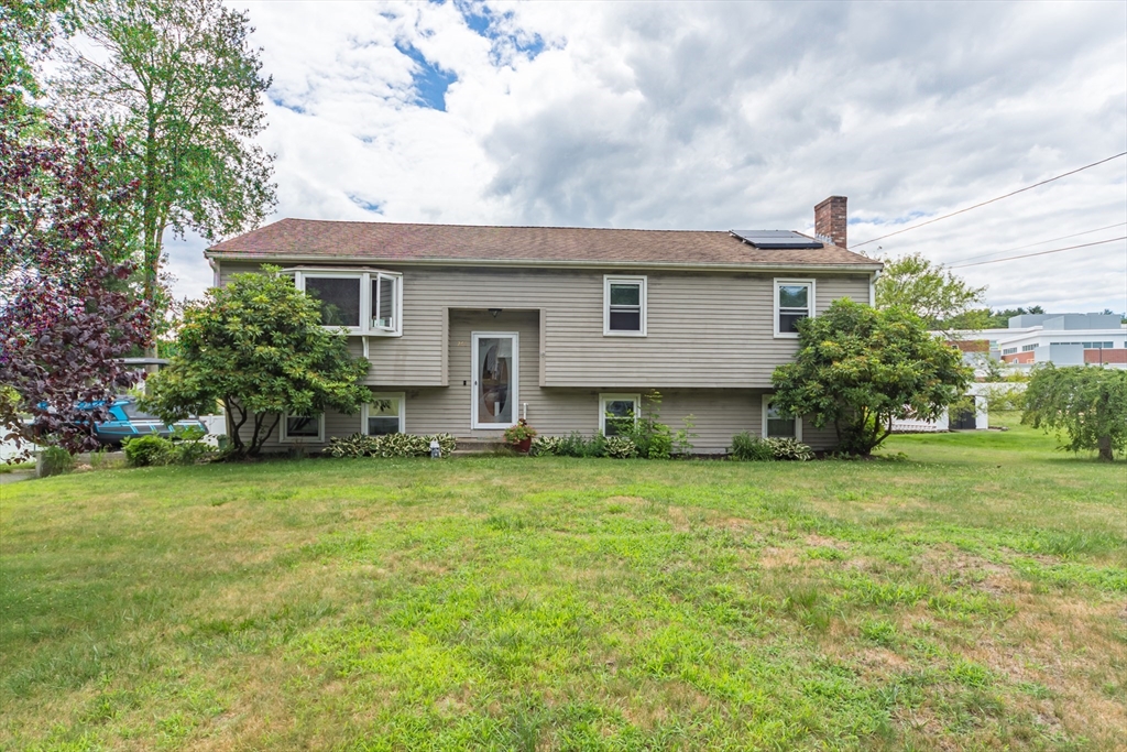 266 Mason Road Northbridge, MA 01588 - Photo 1 of 25 a front view of house with yard and trees
