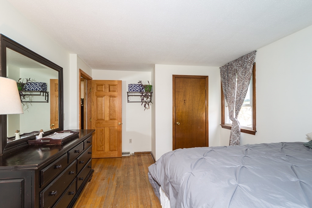 266 Mason Road Northbridge, MA 01588 - Photo 12 of 25 a bedroom with a bed and a dresser
