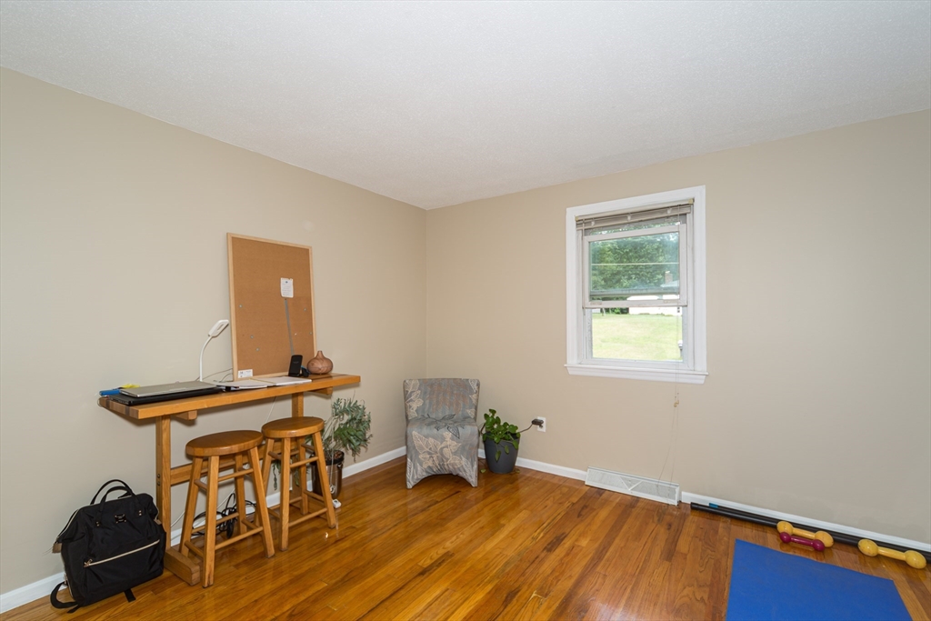 266 Mason Road Northbridge, MA 01588 - Photo 16 of 25 a workspace with furniture and wooden floor