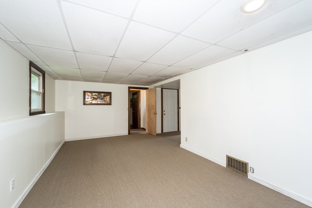 266 Mason Road Northbridge, MA 01588 - Photo 19 of 25 a view of an empty room with a window