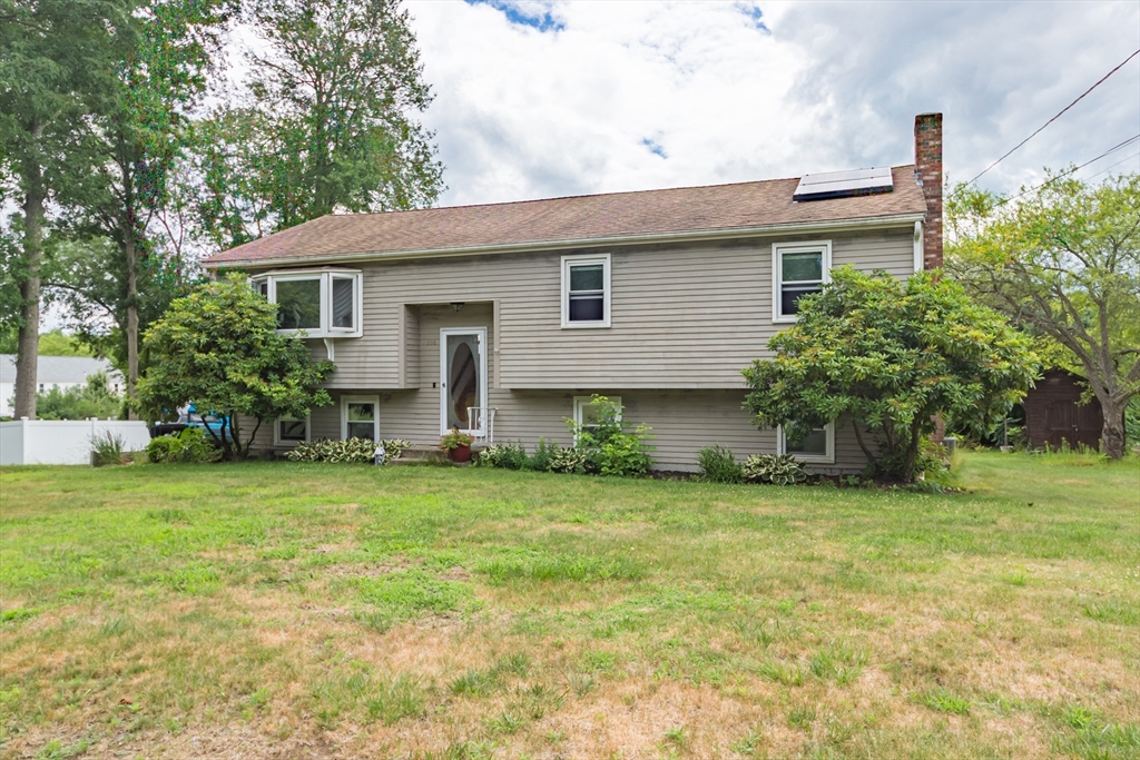 266 Mason Road Northbridge, MA 01588 - Photo 2 of 25 a front view of a house with a garden