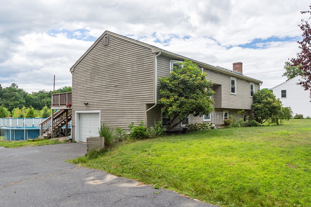 266 Mason Road Northbridge, MA 01588 - Photo 3 of 25 a view of a house with a backyard